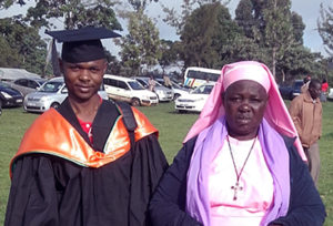 Enock and his mother during his graduation from Karatina University 2015